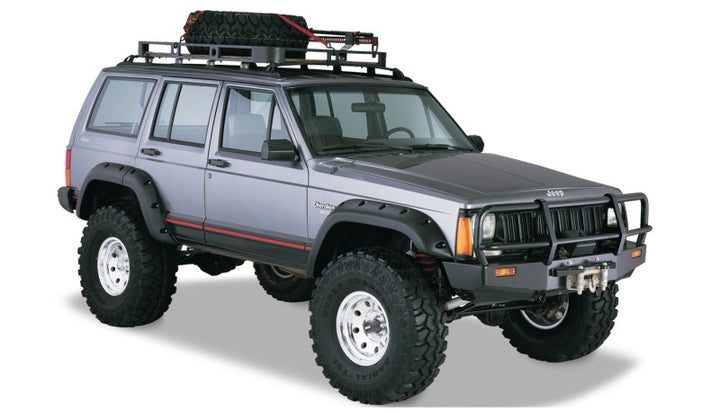 Bushwacker 84-01 Jeep Cherokee Cutout Style Flares 4pc Fits 4-Door Sport Utility Only - Black - Bull Strap