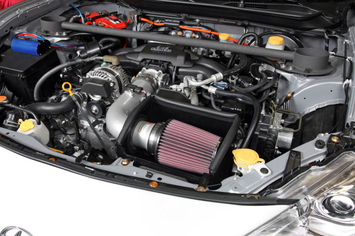 K&N 13 Subaru BRZ 2.0L / 13 Scion FR-S 2.0L Silver 69 Series Typhoon Intake - Bull Strap