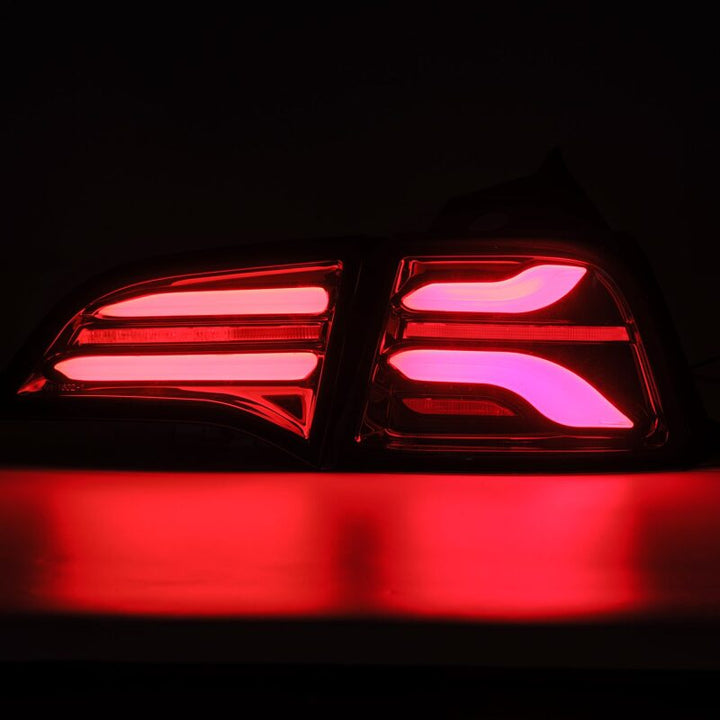 AlphaRex 17-22 Tesla Model 3 PRO-Series LED Tail Lights Jet Black w/Seq Sig - Bull Strap