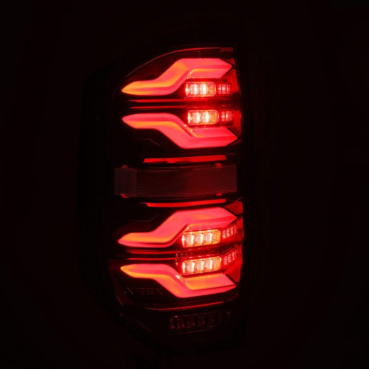 AlphaRex 14-21 Toyota Tundra LUXX LED Taillights Blk w/Activ Light/Seq Signal - Bull Strap