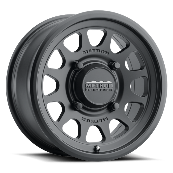 Method MR414 Bead Grip 15x7 / 5+2/38mm Offset / 5x4.5 / 76mm CB Matte Black Wheel - Bull Strap