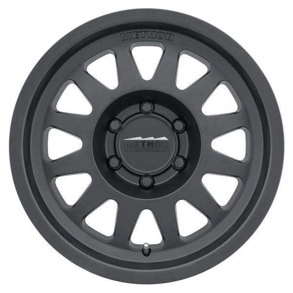 Method MR704 17x8.5 0mm Offset 5x5 71.5mm CB Matte Black Wheel - Bull Strap