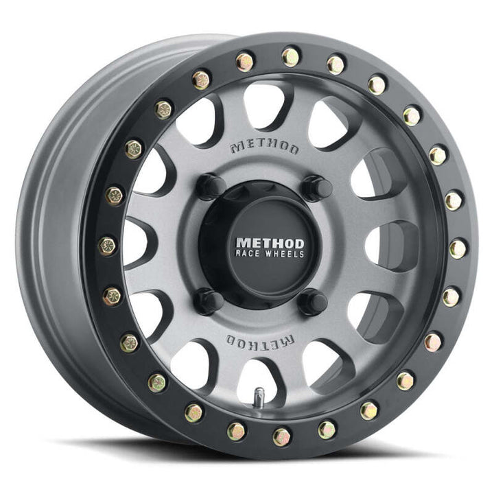 Method MR401 UTV Beadlock 15x7 / 5+2/38mm Offset / 5x4.5 / 72 CB Titanium - Matte Black Ring Wheel - Bull Strap